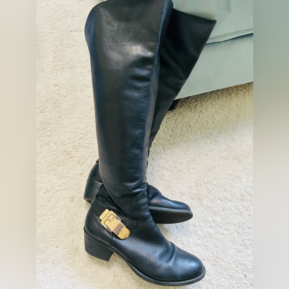 Vince Camuto tall boots. Stretch in the calf area. See photo.